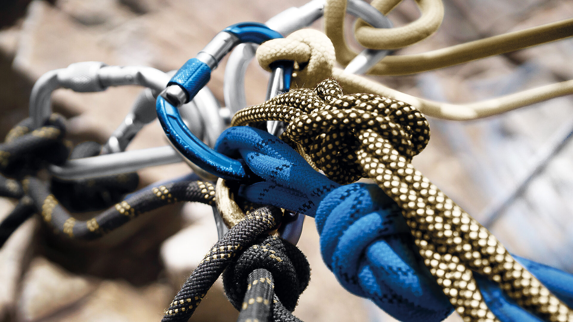 Carabiners and ropes in the mountains.