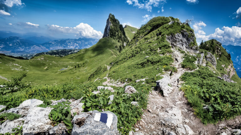 Narrow hiking trails with gravel path on the Swiss Alps Stockhorn and Solhore peak
